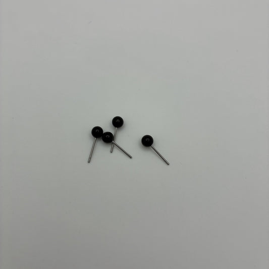 Yeux noirs en plastique 4 mm sur tige métallique pour feutrage à l'aiguille